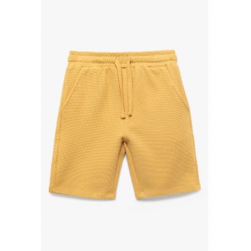 Pantaloni scurti texturati cu buzunare oblice