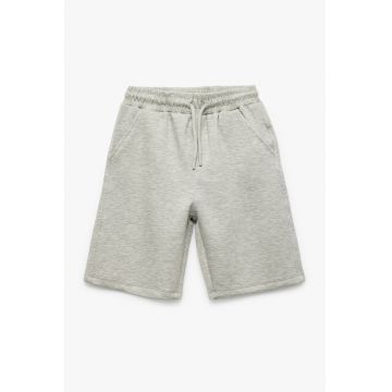 Pantaloni scurti uni cu buzunare laterale